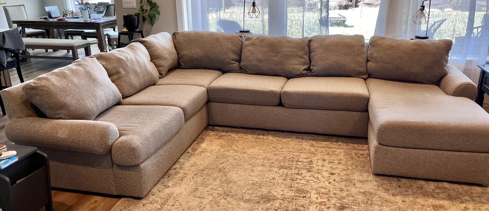 Sectional sofa freshly cleaned by Gold Standard’s upholstery cleaning service